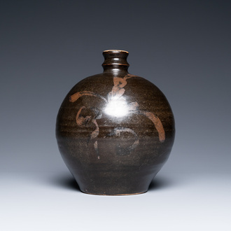 A Chinese black-brown-glazed russet-splashed jar, Henan kilns, Song