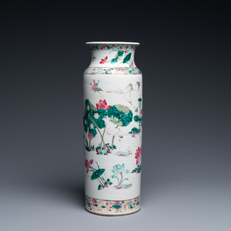 A Chinese famille rose rouleau vase with butterflies and cranes near a lotus pond, 19th C.