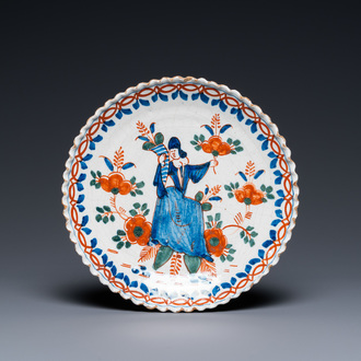 A lobed Dutch Delft cashmere palette plate, dated 1711