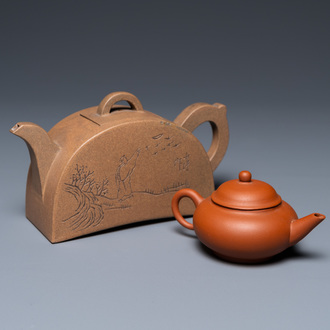 Two Chinese Yixing stoneware teapots with engraved inscriptions, 20th C.