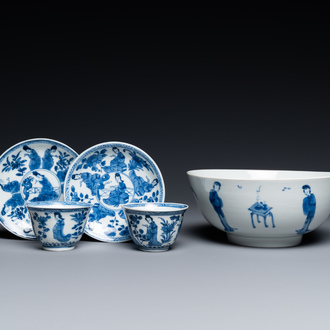 A Chinese blue and white bowl and a pair of cups and saucers, Kangxi