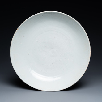 A Chinese monochrome white dish with incised double phoenix design, Jiajing mark, Ming