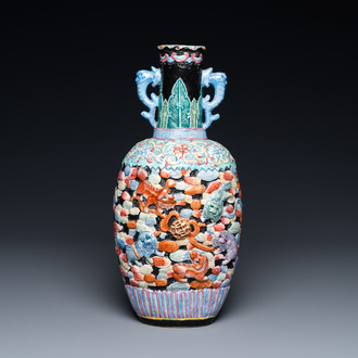 A Chinese famille rose vase with molded design of Buddhist lions, Qianlong mark, 19th C.