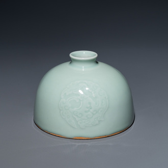 A Chinese celadon-glazed water pot, Kangxi mark, 19th C.