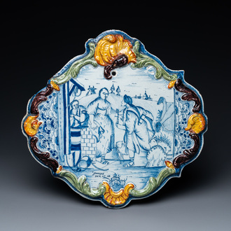 A Dutch Delft blue and white mixed technique biblical subject plaque, 18th C.