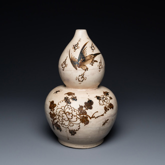 A Chinese Cizhou double gourd vase, Song/Yuan