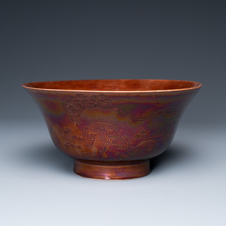 A Chinese aubergine-glazed bowl with incised design of cranes, Kangxi