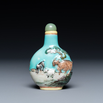 A Chinese relief-molded snuff bottle depicting goats, Yang He Tang mark, 19/20th C.