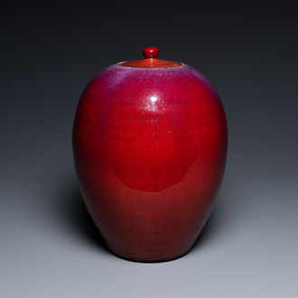 A Chinese monochrome sang de boeuf-glazed vase and cover, 19th C.