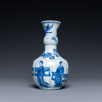 A Chinese blue and white lotus-molded vase, Kangxi