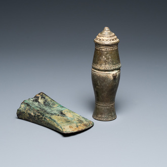 A Vietnamese bronze axe head, Dong Son, 3rd/1st C. BC and a small lime jar, Lê Dynasty, 15th C.