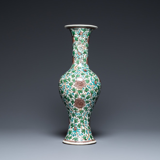 A Chinese verte biscuit 'peony scroll' vase, Ming