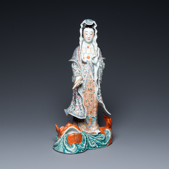 A large Chinese famille rose figure of Guanyin on a fish, Hui Guan Deng Chang Rong Zao mark, 19th C.