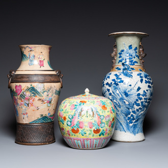 Two Chinese Nanking crackle-glazed vases and a yellow-ground famille rose 'butterflies' jar and cover, 19th C.