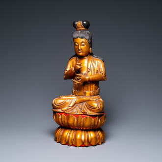 A large Vietnamese or Japanese gilded and lacquered wooden Buddha on lotus throne, 19th C.