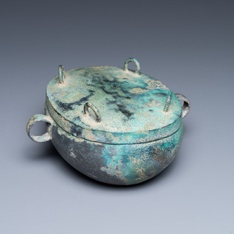 A Chinese archaic bronze 'zhou' bowl and cover, Spring and Autumn period