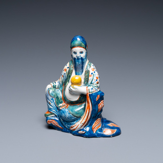 A polychrome Dutch Delft figure of a Chinaman, 18th C.