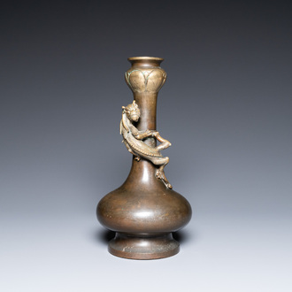 A Chinese bronze garlic-head 'hu' vase, Qianlong mark and of the period