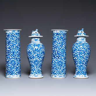 A Chinese blue and white four-piece garniture, Kangxi mark, 19th C.