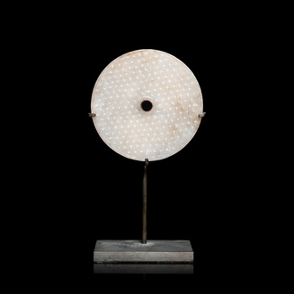 A Chinese white jade bi disc, Han