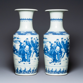 A pair of Chinese blue and white vases, 19th C.