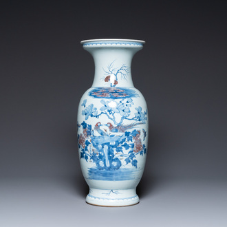 A Chinese blue, white and copper-red vase, 18/19th C.