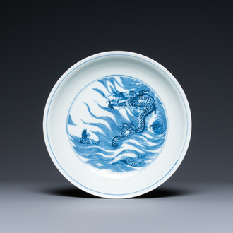 A Chinese blue and white 'dragon and carp' plate, Kangxi mark, Republic