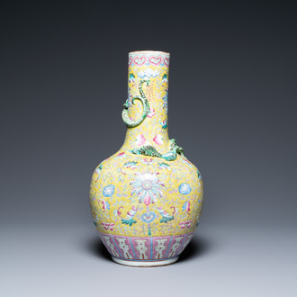 A Chinese yellow-ground famille rose bottle vase, 19th C.