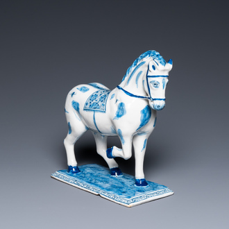 A Dutch Delft blue and white horse, 18th C.