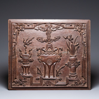 A Chinese carved wooden 'antiquities' panel, 19th C.