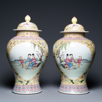 A pair of Chinese famille rose vases and covers, Qianlong mark, Republic
