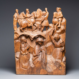 A Flemish carved oak retable fragment: 'Roman soldiers on mount Golgotha', ca. 1500