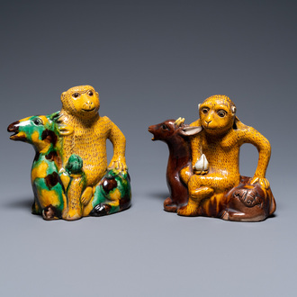 Two Chinese sancai-glazed 'monkey on deer' ewers, 19th C.