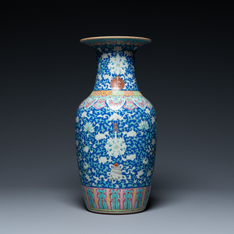 A Chinese famille rose blue-ground 'bajixiang' vase, 19th C.