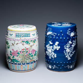 Two Chinese garden seats in famille rose and white slip-decorated blue-ground porcelain, 19th C.
