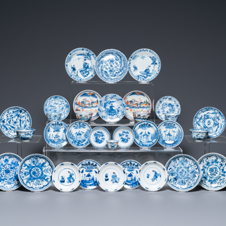 Twenty-seven Chinese blue and white saucers and seven cups, Kangxi and later