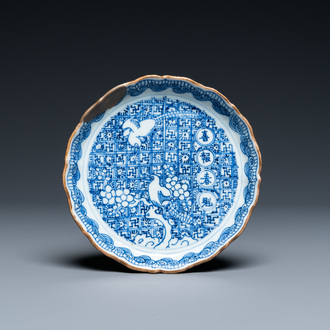 A Chinese blue and white shonzui ko-sometsuke dish with birds and calligraphy for the Japanese market, Chongzhen