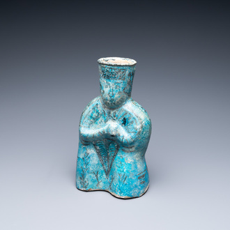 A turquoise- and black-glazed pottery figurative ewer, Kashan, Iran, 12/13th C.