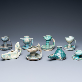 Eight turquoise-glazed oil lamps, Middle-East, 13th C. and later