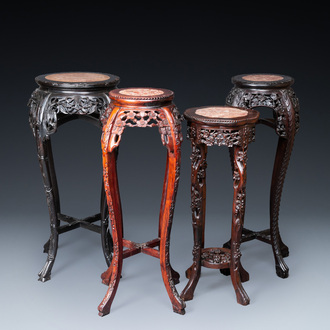 Four Chinese marble-top carved wooden stands, 19/20th C.