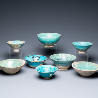 A collection of eight turquoise-glazed bowls, Persia and the Middle-East, 13th C. and later