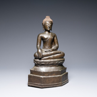A large Lanna-style bronze figure of Buddha, Laos or Northern Thailand, mid 16th C.