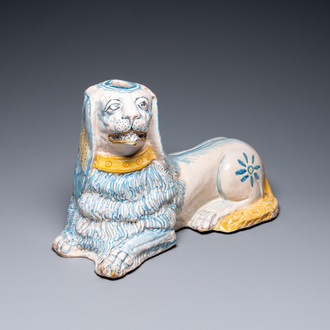 A large blue, white and yellow model of a recumbent lion, Nevers, France, 17th C.
