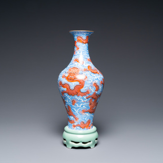 A Chinese revolving 'dragon' vase on celadon stand, Qianlong mark, 20th C.