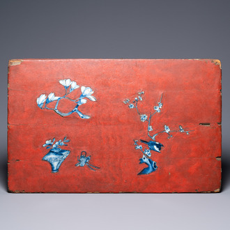 A Chinese porcelain-embellished lacquered wooden panel, 18th C.