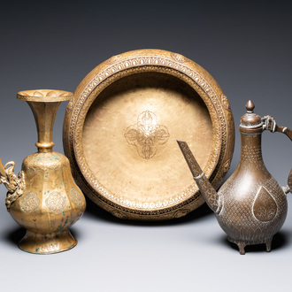 A Tibetan brass ewer, an alms bowl and an Indian bronze ewer, 18/19th C.