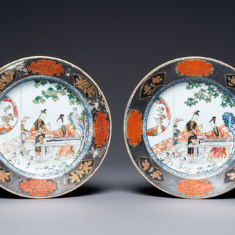 A pair of Chinese famille rose plates with ladies playing music, Yongzheng