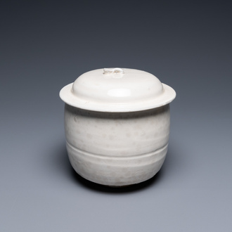 A Chinese cream-glazed jar and cover, Northern Song