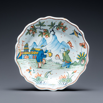 A fine polychrome French faience 'chinoiserie' dish with lobed border, Rouen, 1st half 18th C.