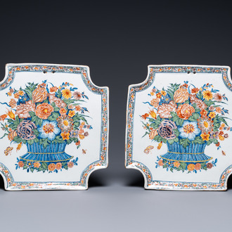 A pair of exceptionally fine polychrome Dutch Delft flower basket plaques, 18th C.